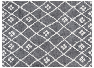 Grey and white geometric patterned rug