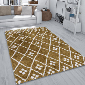 Mustard patterned rug on a wooden floor in a living room setting