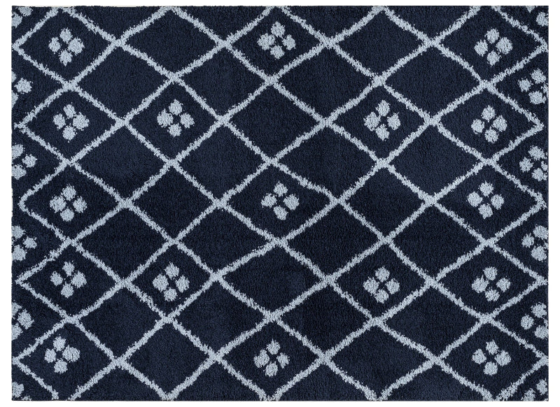 Navy blue rug with white geometric pattern