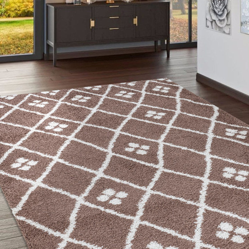 Brown and white patterned rug on a wooden floor with a sideboard in the background.