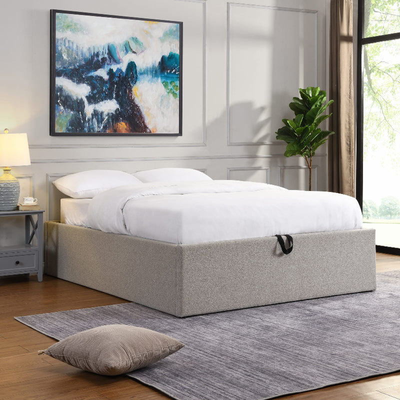 Bedroom with a bed, nightstands, and a painting on the wall.