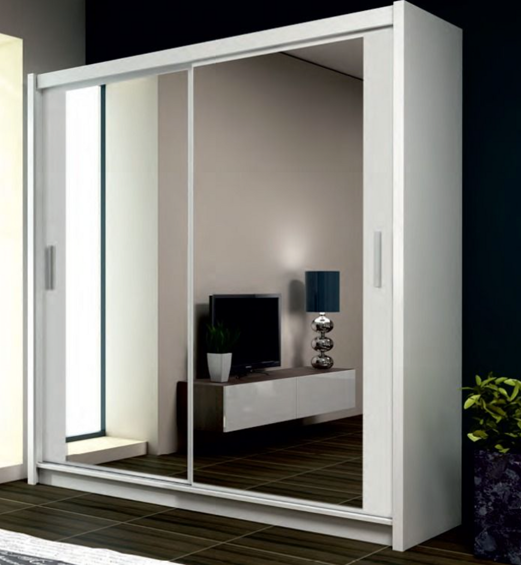 Modern white wardrobe with sliding glass doors in a room setting.