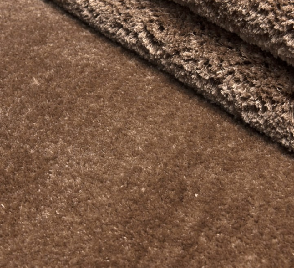 Close-up of brown fabric with a textured surface