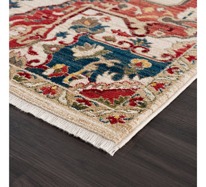 Decorative rug with intricate patterns on a wooden floor