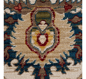 Close-up of a patterned rug with intricate designs and colors.