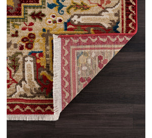 Decorative rug with intricate patterns on a wooden floor