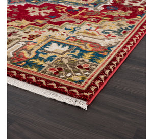 Decorative rug with intricate patterns on a wooden floor