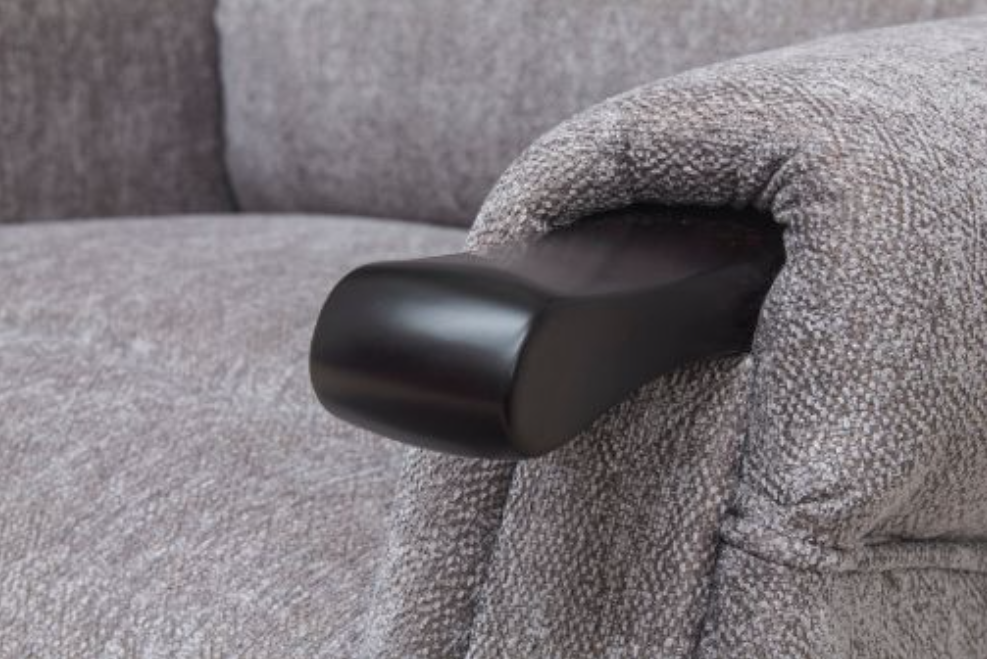Gray upholstered chair with a black armrest cover