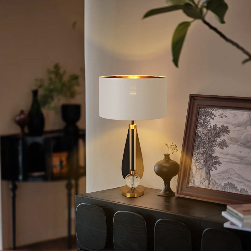 Decorative table lamp on a console table with a blurred background