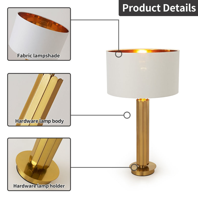 Table lamp with fabric lampshade and gold hardware, showing detailed components.