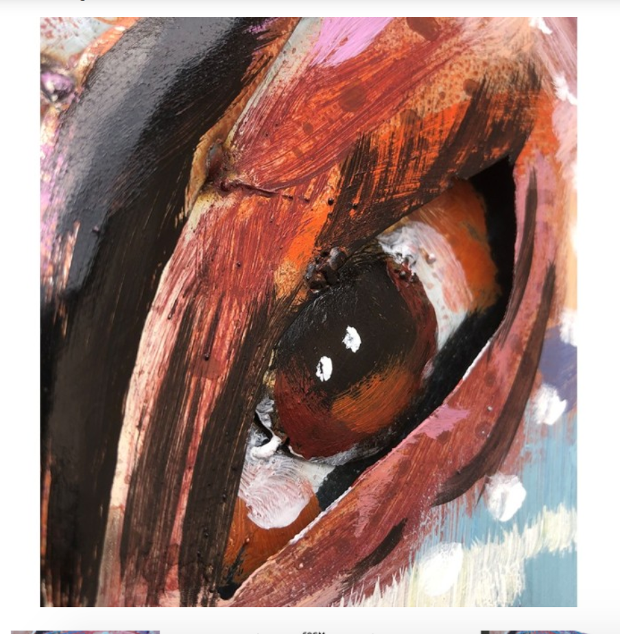 Close-up of a painting of a horse's eye with expressive brushstrokes.