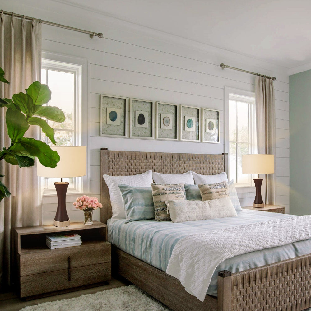 Neatly arranged bedroom with a bed, nightstands, and decorative elements.