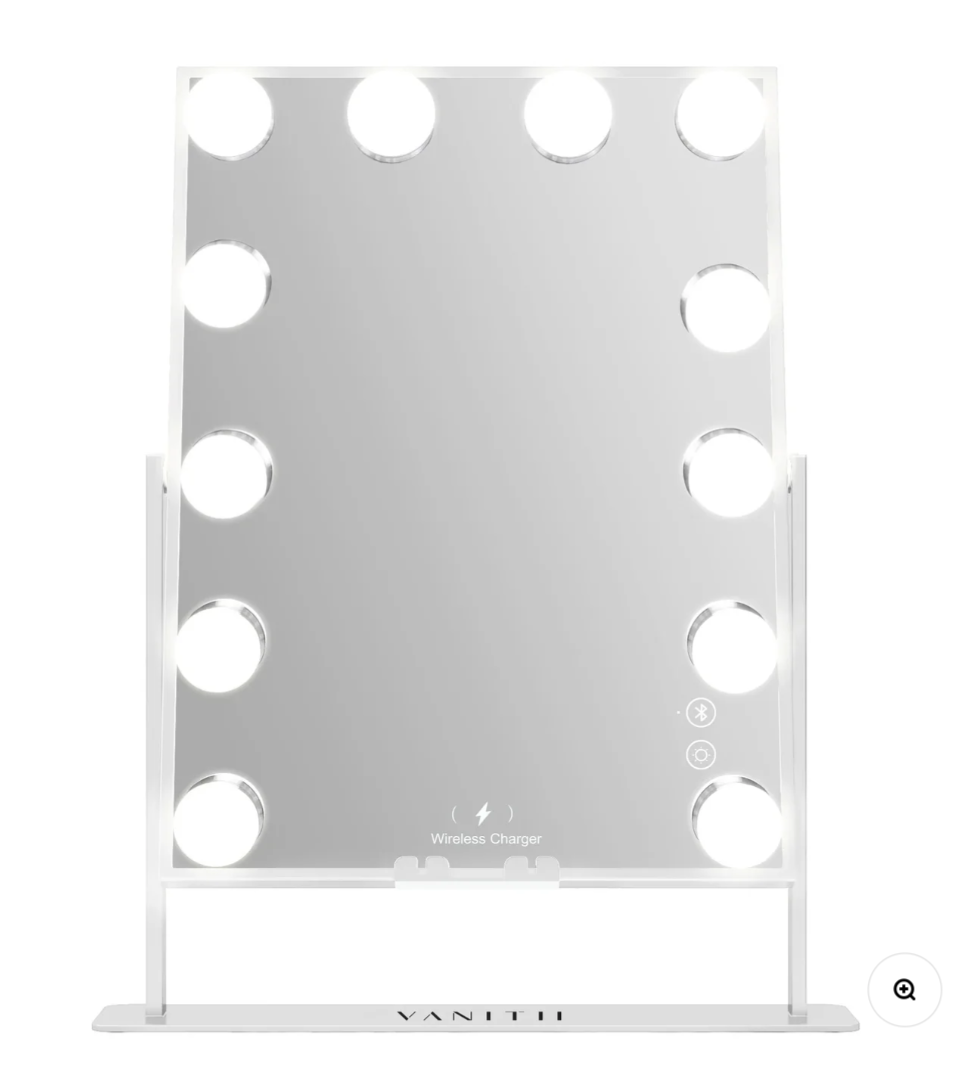 Makeup mirror with LED lights on a white background