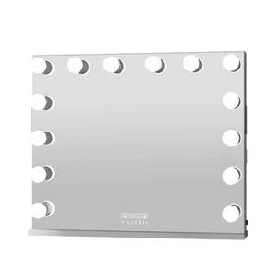 Metallic sheet with circular cutouts on a white background