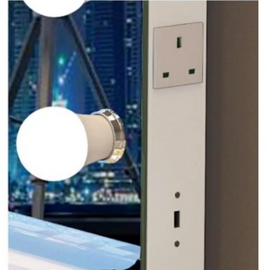 Light bulb design wall switch with cityscape background