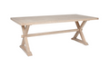Wooden dining table with X-shaped legs on a white background