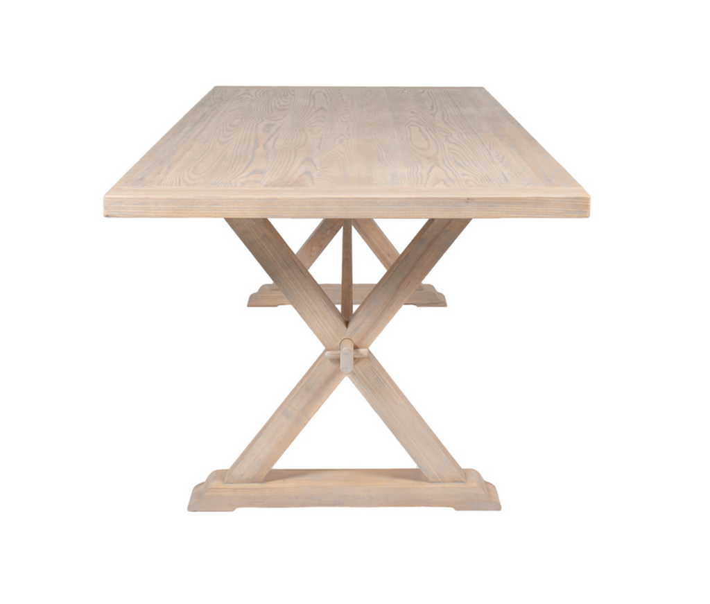 Wooden table with a X-shaped base on a white background
