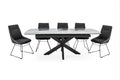 A contemporary dining table with a ceramic top and black powder-coated legs, accompanied by four black chairs with a minimalist design.