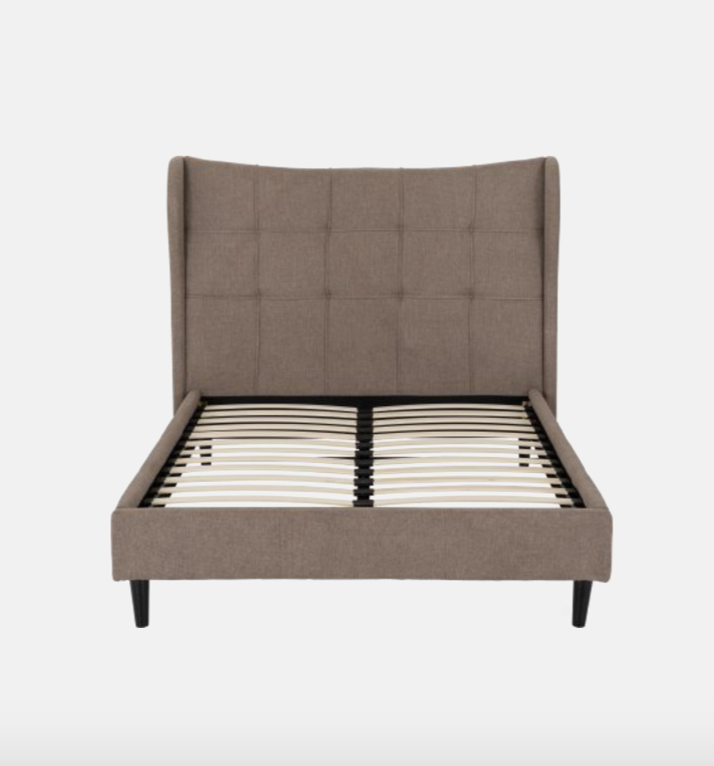 Brown upholstered bed frame on a white background