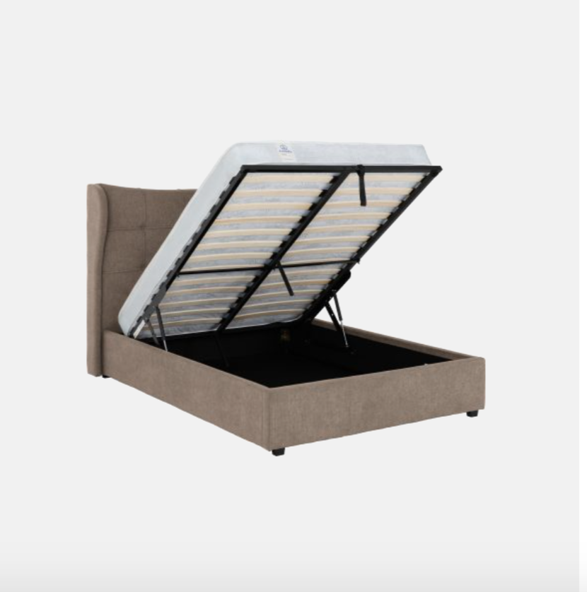 Beige upholstered bed with open storage compartment on a white background