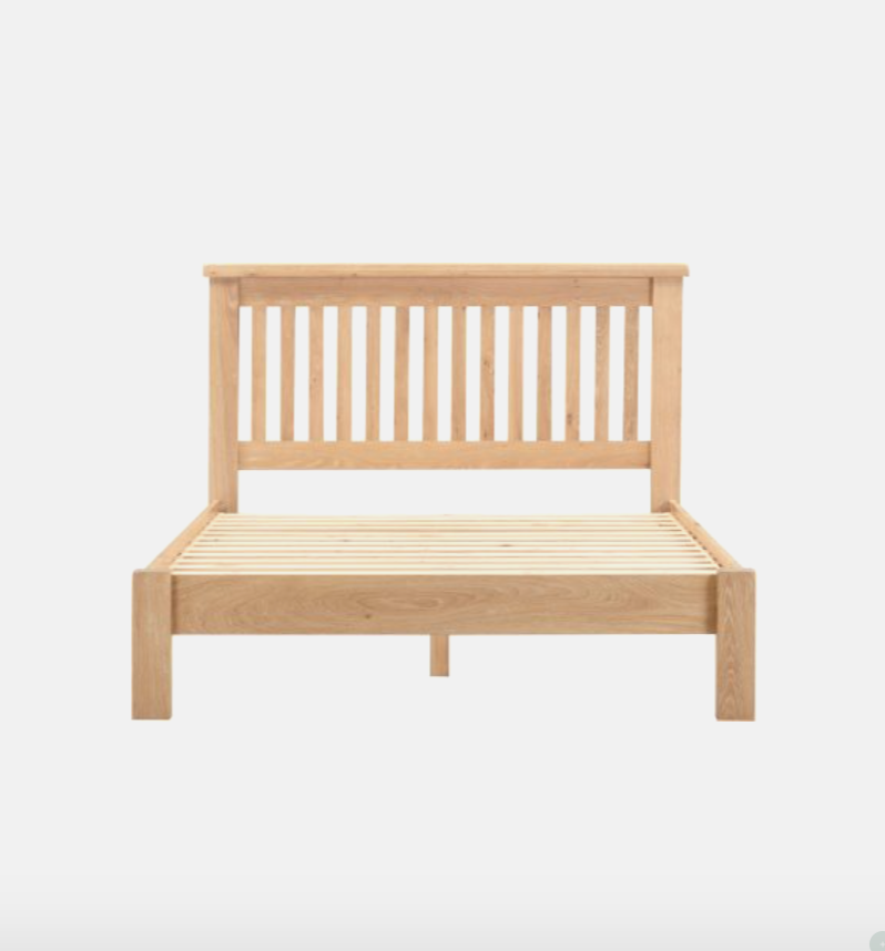 Wooden bed frame on a white background