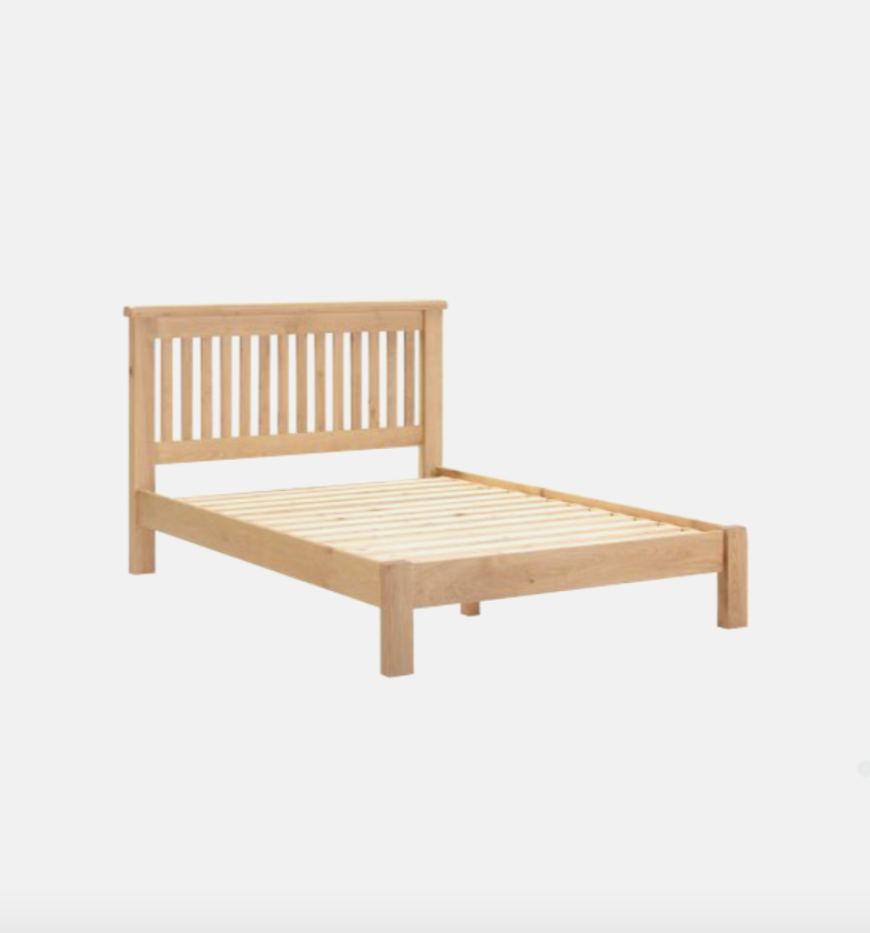 Wooden bed frame on a white background