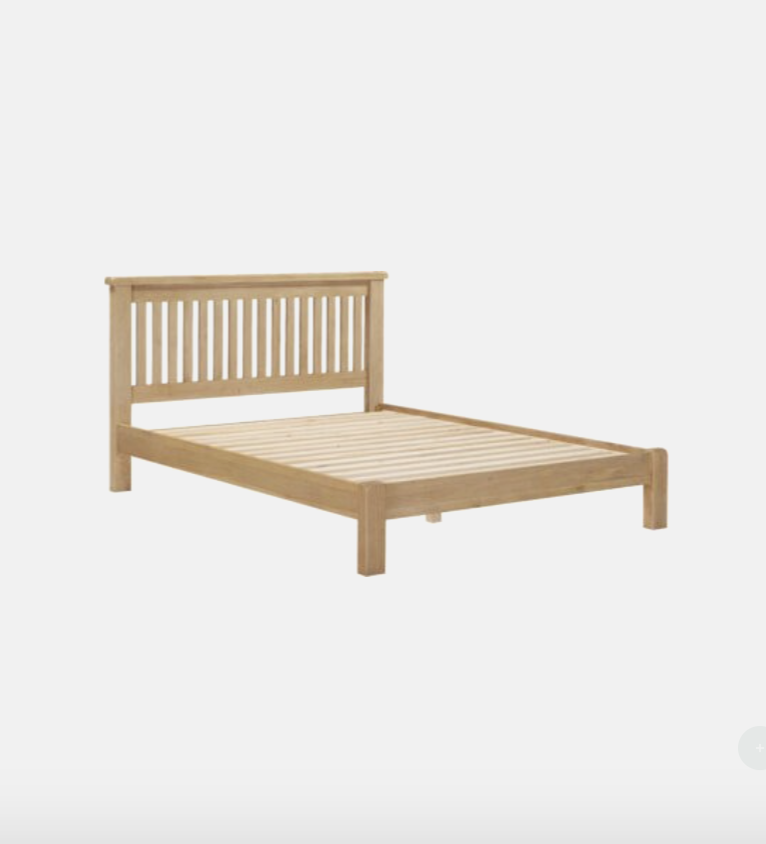 Wooden bed frame on a white background
