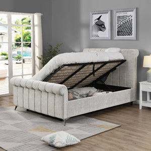 Beige upholstered bed with storage compartment in a room with a pool view.