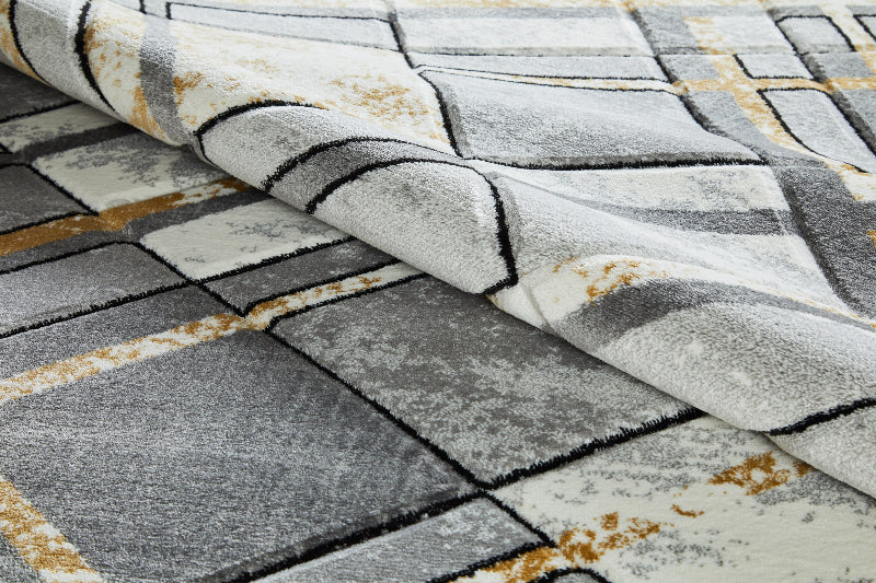 Gray and white checkered rug with gold accents
