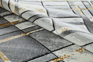 Gray and white checkered rug with gold accents