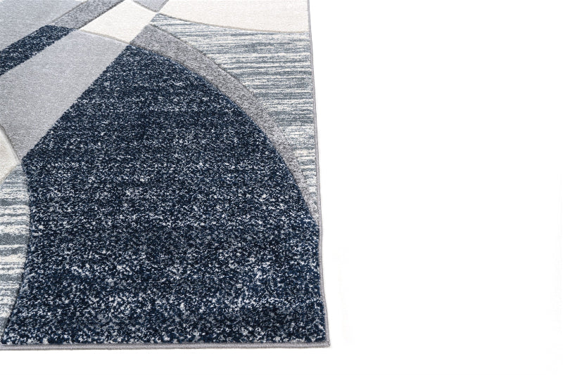 Gray and black patterned rug on a white background