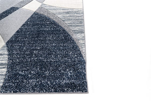 Gray and black patterned rug on a white background