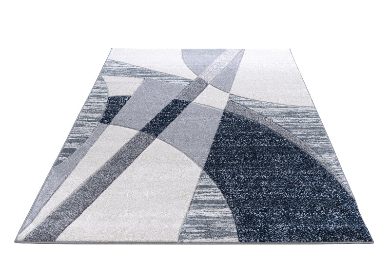Geometric patterned rug with gray and white colors on a white background