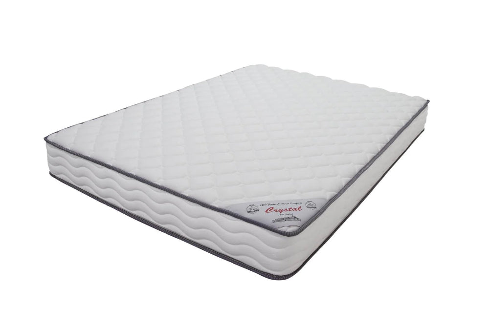 Mattress with 'Crystal' branding on a white background