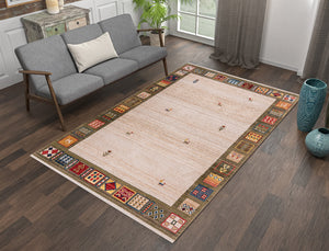Decorative rug with geometric pattern on wooden floor in living room