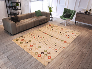 Living room with a patterned rug, brown sofa, and green chair.